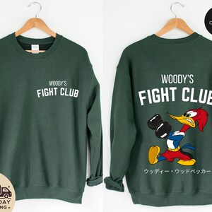 a pair of sweatshirts featuring woody's fight club and woody's fight