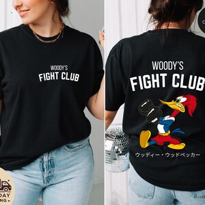 a woman wearing a t - shirt that says woody's fight club