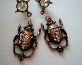 Beetle With Skull In Grasp Jewelry Findings, Rhinestone Set, Earring Post And Dangle, Antiqued Copper Plate