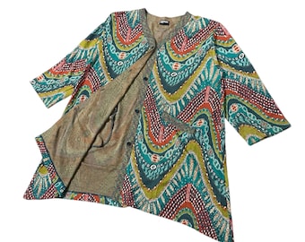 May include: A colorful, patterned cardigan in shades of teal, orange, and green. The open-front jacket features a unique design with a button closure and three-quarter sleeves. The interior lining is a muted, earthy tone.