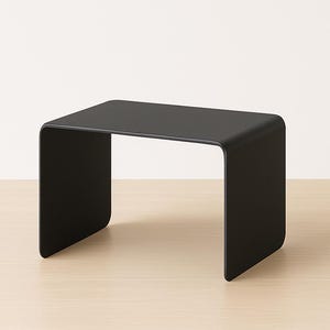 Minimalist Black Steel Coffee Table: Seamless U-Shaped Accent Table