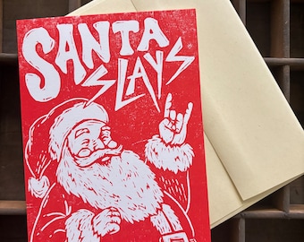 Santa Slays Woodcut Greeting Card