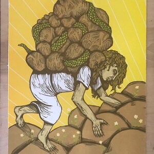 May include: A woodcut print of a person carrying a large pile of rocks on their back, climbing up a rocky hill. The print is in shades of brown, green, and yellow. The text at the bottom reads "May the boulders you carry be the boulders you climb."