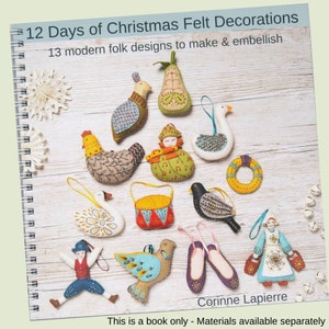 May include: A book titled "12 Days of Christmas Felt Decorations" with 13 modern folk designs to make and embellish. The cover features a variety of felt ornaments, including a pear, a bird, a swan, a drum, and a pair of ballet shoes.