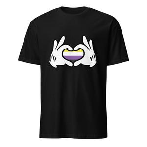 May include: Black t-shirt featuring a heart shape formed by white cartoon hands. The heart is filled with the non-binary pride flag colors: yellow, white, purple, and black. The shirt is a classic crew neck style.