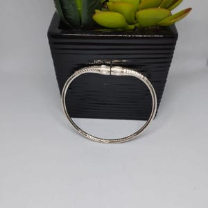 Vangovango Madagascar custom bangle bracelet in solid silver, model 3, traditional motifs