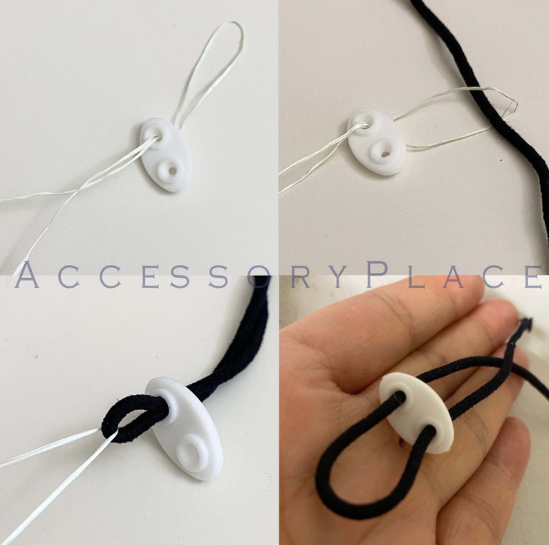 May include: White plastic cord lock with two holes. The cord lock is threaded with white string and black string.