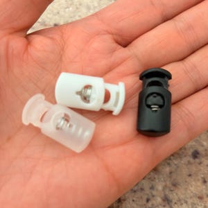 Medium Single Hole Cord Stopper - Elliptic Cylinder Spring Loaded Toggle - Non-Slip Cord Lock for Paracord, Drawstring, Bags - Black, White