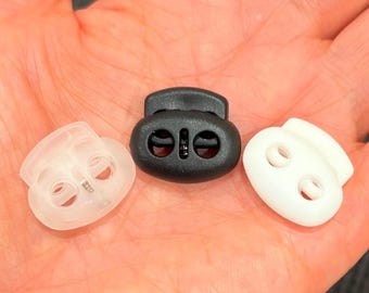 Plastic Oval Cord Locks - Flat Double Hole Spring Toggles for Drawstrings, Bean Shape 2 Hole String Stopper for Face Masks, Hoodies, Jackets