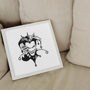May include: A framed black and white illustration of a jester with a sinister grin. The jester is holding a device with playing card symbols. The artwork is displayed on a white background within a light gray frame.
