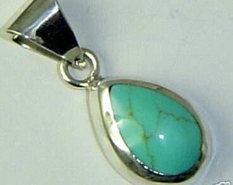 Vintage Turquoise and Sterling Silver pendant made in Mexico