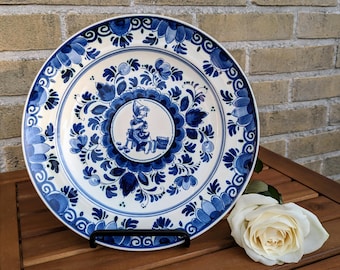 Plato de pared vintage de Delft – Motivo floral de niña holandesa, decoración para habitación infantil