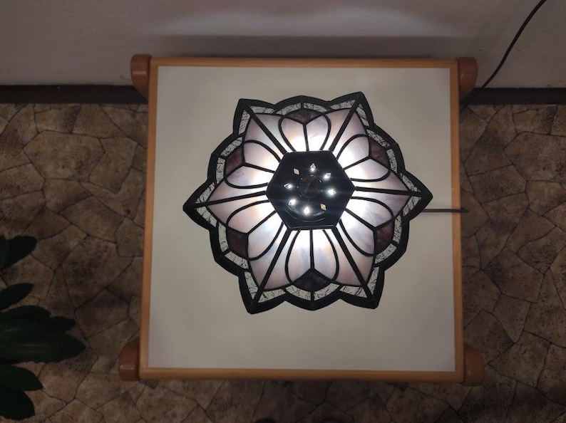 Pattern on a stained glass hexagonal lamp