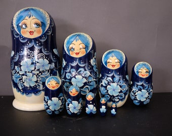 Vintage Winking Eyes Russian 9-Piece Nesting Dolls Set