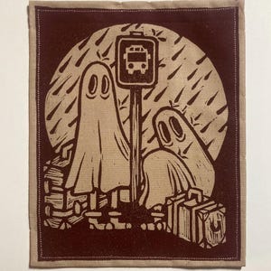 Handgemaakte linosnedepatch - wacht op de bus