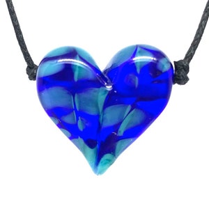 Cobalt Blue with Turquoise Confetti and Clear Flameworked Glass Heart Necklace on an adjustable black cotton cord