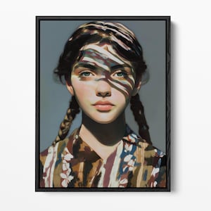May include: A framed portrait painting of a person with braided hair and green eyes. The face is partially obscured by abstract, colorful light patterns in shades of blue, red, and white. The person wears a brown, white, and black patterned shirt.