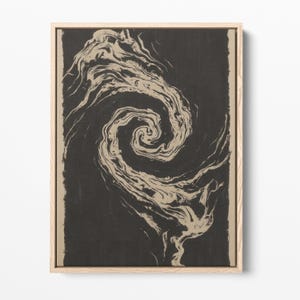 May include: Abstract art print featuring a swirling design in shades of black and beige. The artwork is framed in a natural wood frame, adding a touch of warmth to the piece. The spiral pattern creates a sense of movement and depth.