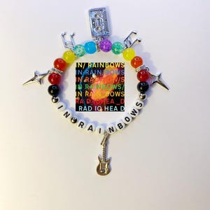 handmade radiohead inspired in rainbows with Y2K gothic charms and guitar and a little radio music note deftones ptv nirvana the smiths duo