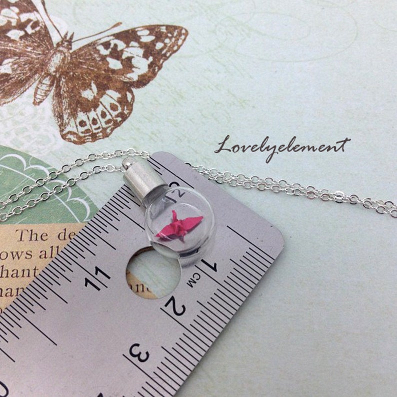 smallest origami crane necklace, flat round glass vial image 4