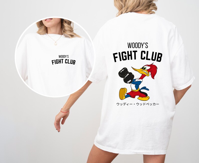 a woman wearing a mickey mouse t - shirt