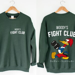 a pair of sweatshirts with woody's fight club on them