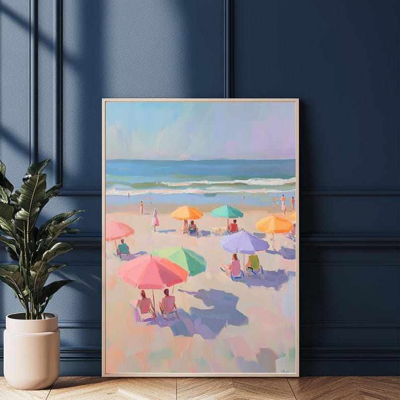 May include: A painting of a beach scene with colorful umbrellas and people relaxing on the sand. The ocean is in the background and the sky is a light blue.
