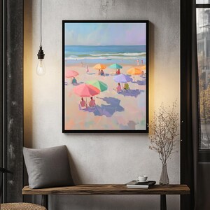 May include: A painting of a beach scene with colorful umbrellas and people relaxing on the sand. The ocean is in the background and the sky is blue.