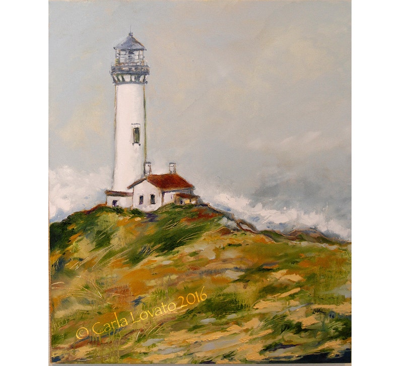May include: A white lighthouse with a red roof stands on a grassy hilltop against a cloudy sky. The lighthouse is tall and slender, with a white tower and a red roof. The hilltop is covered in green grass and brown brush. The sky is a light blue with white clouds.