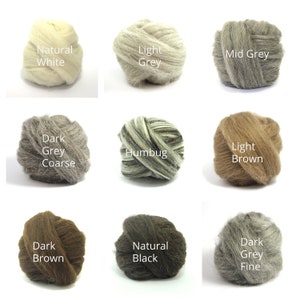 May include: Nine balls of wool in various shades of gray, brown, and white. The wool is labeled with the color names: Natural White, Light Grey, Mid Grey, Dark Grey Coarse, Humbug, Light Brown, Dark Brown, Natural Black, and Dark Grey Fine.