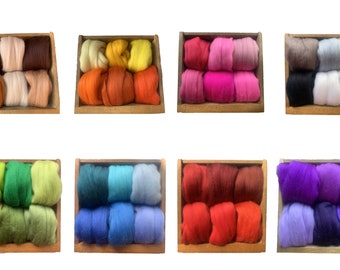 May include: A set of ten wooden boxes, each containing six balls of wool in different colors. The colors include brown, beige, yellow, orange, pink, gray, white, black, green, blue, red, and purple.