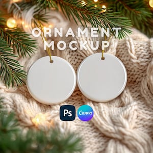 May include: Two blank white circular ceramic ornaments with gold hanging strings. The text ORNAMENT MOCKUP is visible at the top. Below the ornaments are two small circular icons with the text Ps and Canva. The ornaments are displayed against a textured cream-colored knit fabric.