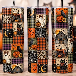 May include: Three cylindrical tumblers with metal straws featuring a patchwork design of Halloween motifs including black cats, ghosts, pumpkins, sunflowers, crows, barns, tractors, spiderwebs, moons, and plaid patterns in orange, black, and purple.