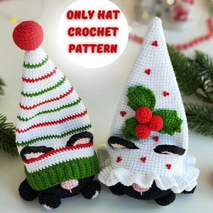May include: Two crocheted Christmas elf hats with black faces and white trim. One hat is red and green striped, the other is white with a holly design. The text "ONLY HAT CROCHET PATTERN" is visible in the image.