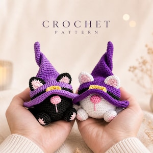 May include: Two crocheted cat figures, one black and one white, each wearing a purple witch hat with a yellow band. The cats have pink noses and ears. The image includes the text "CROCHET PATTERN".
