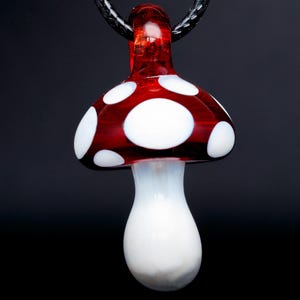 Glass mushroom pendant red and white close up
