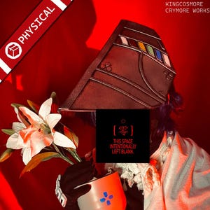 May include: A dark brown headpiece with geometric designs and colourful accents. A white and orange flower and a white and orange cup with blue accents are also visible. The text "THIS SPACE INTENTIONALLY LEFT BLANK" is displayed on a black background.