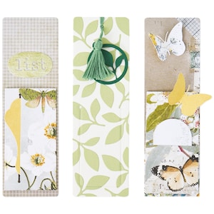 May include: Three decorative bookmarks with different designs. The first bookmark has a green and white leaf pattern with a green tassel. The second bookmark has a white background with a floral pattern and the word "list" written on it. The third bookmark has a brown background with a butterfly and floral pattern.