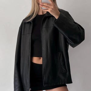 Blouson aviateur classique en cuir noir pur femme des années 70, cuir de mouton coupe droite surdimensionné, veste en cuir pour femmes, veste en cuir souple pour femmes