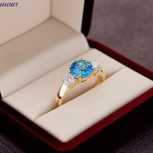 Three Stone Blue Topaz Engagement Ring | Yellow Gold Plated Round Cut Topaz & Moissanite Ring December Birthstone Ring Dainty Promise Ring