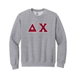 Moletom com gola redonda e letras gregas da fraternidade Delta Chi