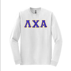 May include: White long-sleeve shirt with the Greek letters ΛXA in blue with a gold outline. The shirt is made of a soft material and has a crew neck. The letters are centered on the front of the shirt.