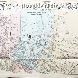 May include: A vintage map of Poughkeepsie, New York, showing the city's streets and buildings. The map is divided into four sections, labeled I, II, III, and IV. The map is printed in black and white, with some areas shaded in pink, blue, and green.
