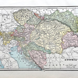 May include: A vintage map of Austria-Hungary, showing the different regions and provinces of the Austro-Hungarian Empire. The map is printed in color and includes a key with the names of the different regions. The map is dated 1868.