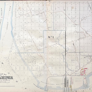 May include: A vintage map of Philadelphia, Pennsylvania, showing the city's layout and streets. The map is titled "Baist's Atlas of the City of Philadelphia" and includes a key for understanding the map's symbols. The map is divided into sections, with each section representing a different ward of the city. The map also includes a legend that explains the different symbols used on the map.