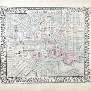 May include: A vintage map titled "PLAN OF BALTIMORE" with a decorative border. The map features a detailed street layout, with numbered sections and the text "N.W. BRANCH OF PATAPSCO RIV." The map is in shades of green, pink, and gray.