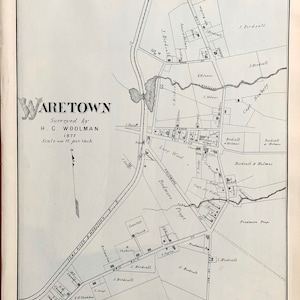 May include: A detailed black and white map of Waretown, surveyed by H.C. Woolman in 1877. The map includes street names, property lines, and landmarks such as a church and cemetery. The scale is 400 feet per inch.