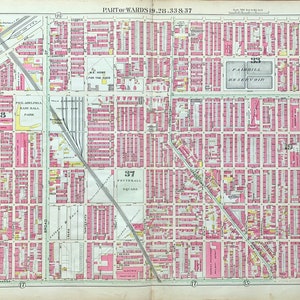 May include: A detailed map of a section of Philadelphia, Pennsylvania, showing the layout of streets and buildings. The map is divided into numbered blocks, with the text "PART of WARDS 19, 28, 33 & 37" at the top. The map is printed in black and white, with some areas shaded in pink.