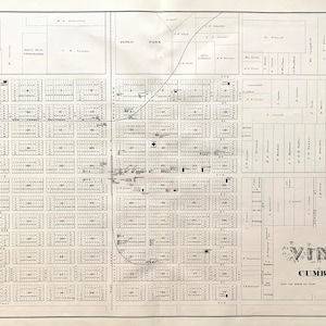 May include: A black and white map of Vineland, Cumberland County, New Jersey, dated 1874. The map shows the layout of streets and blocks in the city. The map is titled "Vineland, Cumberland Co. N.J. 1874."