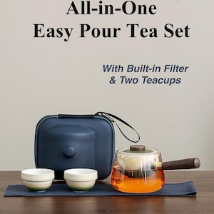 May include: An all-in-one easy pour tea set with a built-in filter and two teacups. The set includes a glass teapot with a wooden handle, two small teacups, and a navy blue carrying case. The text "All-in-One Easy Pour Tea Set" is visible.